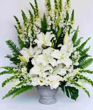 arreglo floral blanco puerta del cielo