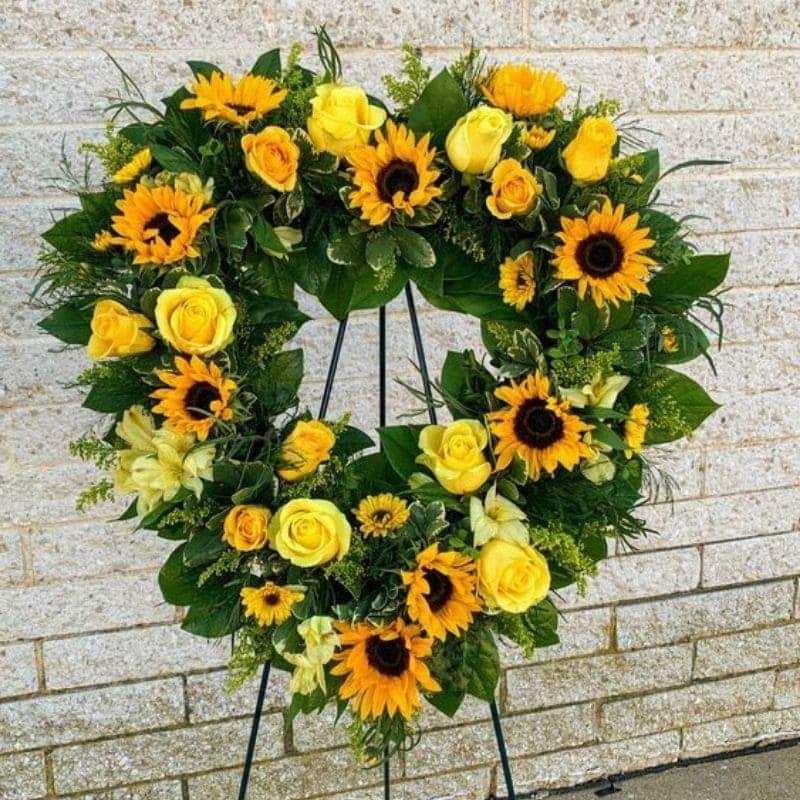 arreglo fúnebre girasol