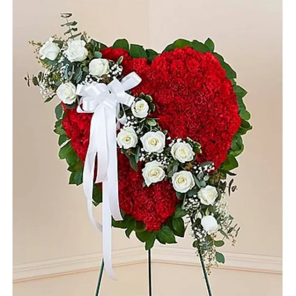 Corona fúnebre corazón de claveles