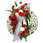 Corona fúnebre de gerberas rojas